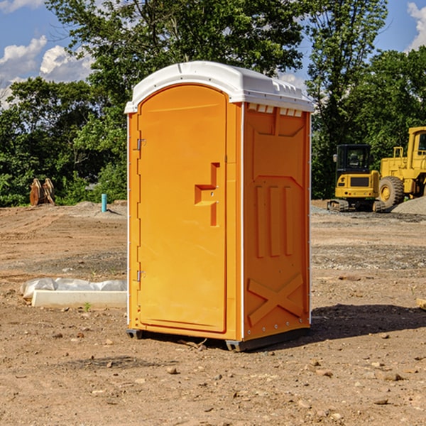 what is the cost difference between standard and deluxe portable toilet rentals in Norge OK